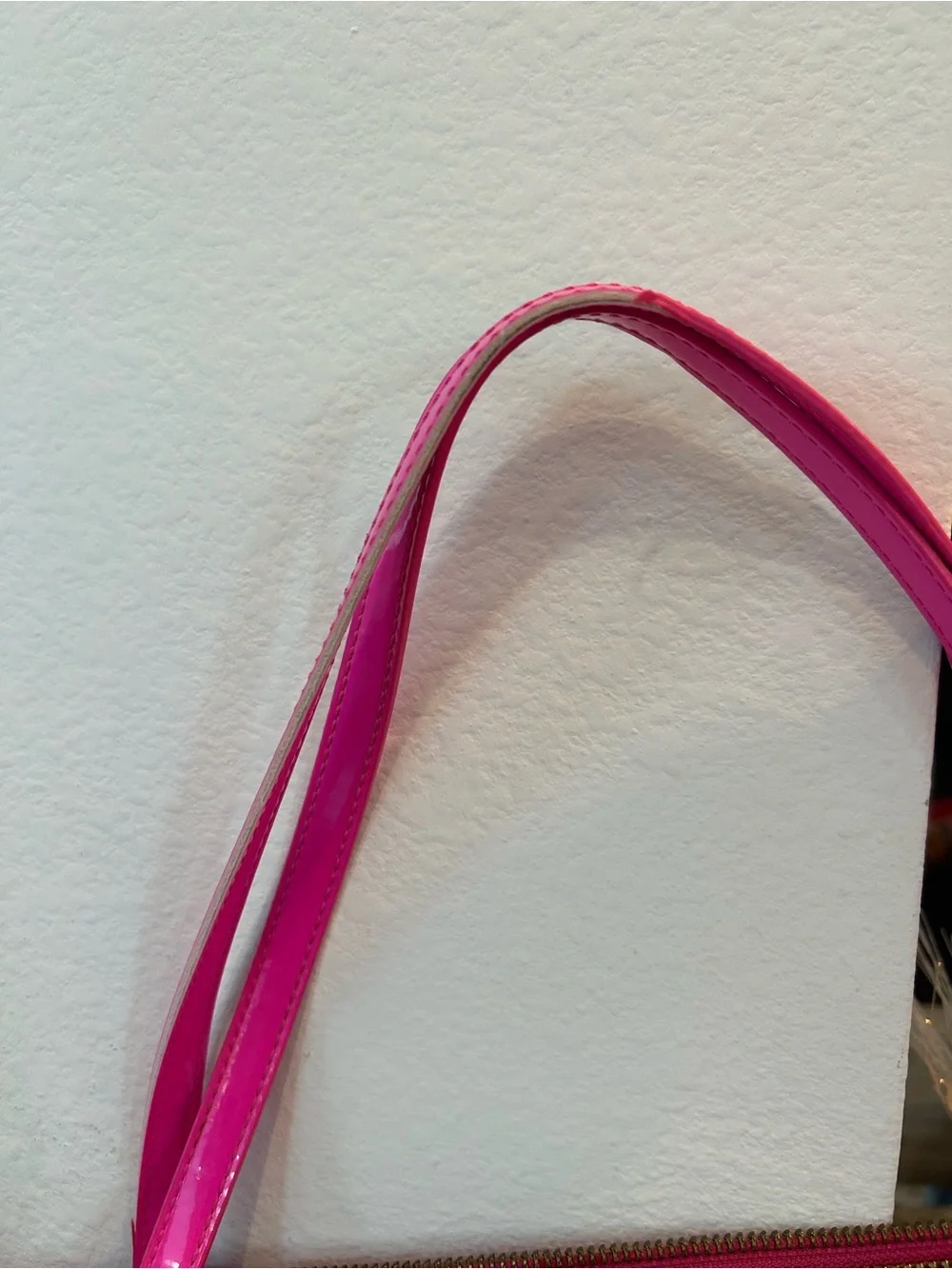 kate spade camellia st Sophie Tote in Hot Pink has a few marks scuffs peeling